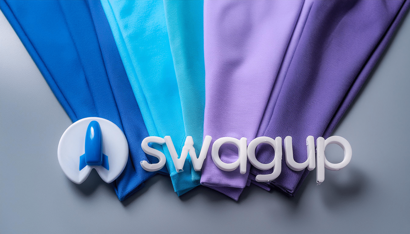 logo of swagup with 5 different colored fabrics behind it